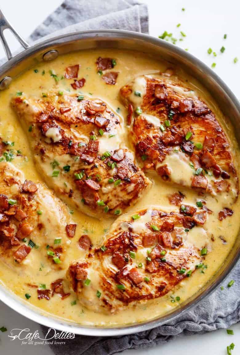 Creamy Beer Cheese Chicken With Crispy Bacon is ready in less than 20 minutes! Beer, cheddar cheese, pan fried chicken AND bacon? What's not to love!