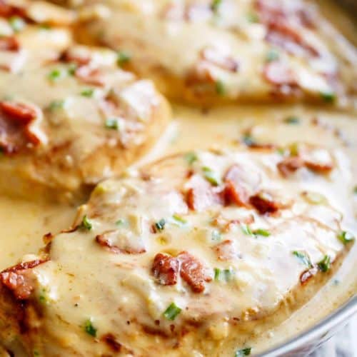 Creamy Beer Cheese Chicken With Crispy Bacon is ready in less than 20 minutes! Beer, cheddar cheese, pan fried chicken AND bacon? What's not to love!