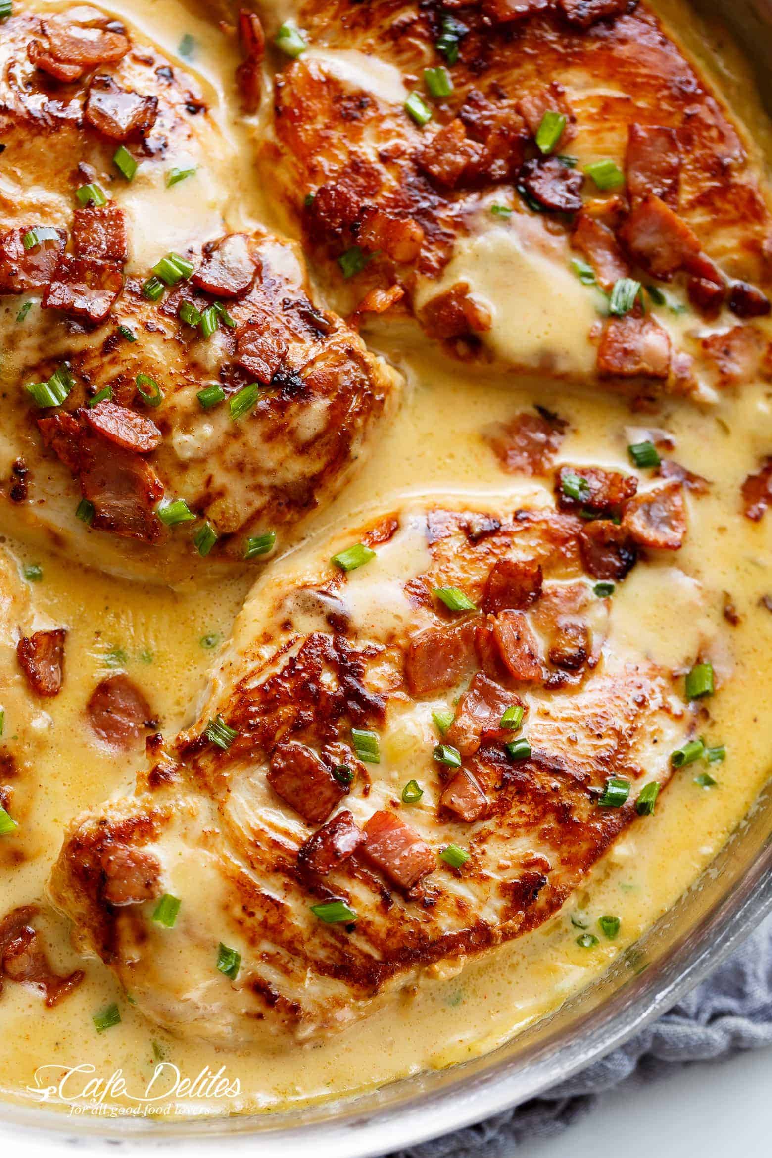 Creamy Beer Cheese Chicken With Crispy Bacon is ready in less than 20 minutes! Beer, cheddar cheese, pan fried chicken AND bacon? What's not to love!