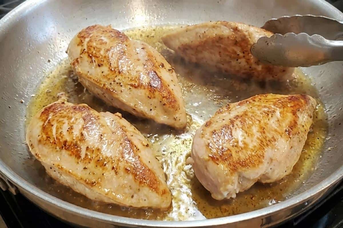 Frying the chicken in the pan. - 5