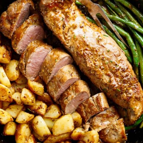 Dijon Garlic Pork Tenderloin & Veggies is a complete meal with crispy potatoes and tender green beans!