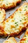 Want just one piece of garlic bread? Individual Garlic Cheese Breads are quick to make and can be served with just about anything! Soups, pastas, steak and potatoes, stews, ANYTHING! | cafedelites.com