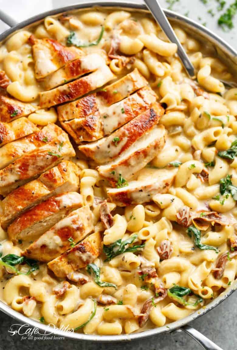 Tuscan Chicken Mac And Cheese is a ONE POT dinner made on the stove top, in less than 30 minutes! It will be hard to go back to regular Mac and Cheese! | Cafe Delites
