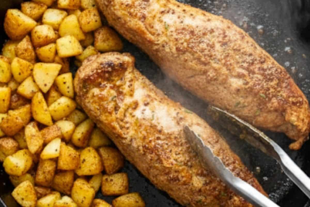 Push potatoes to one side; add tenderloins to the open space; sear on four sides until lightly browned