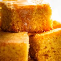 Easy Buttermilk Cornbread with a hint of honey is the perfect side to chili's, soups or stews! Crunchy buttery edges with a soft and fluffy centre!