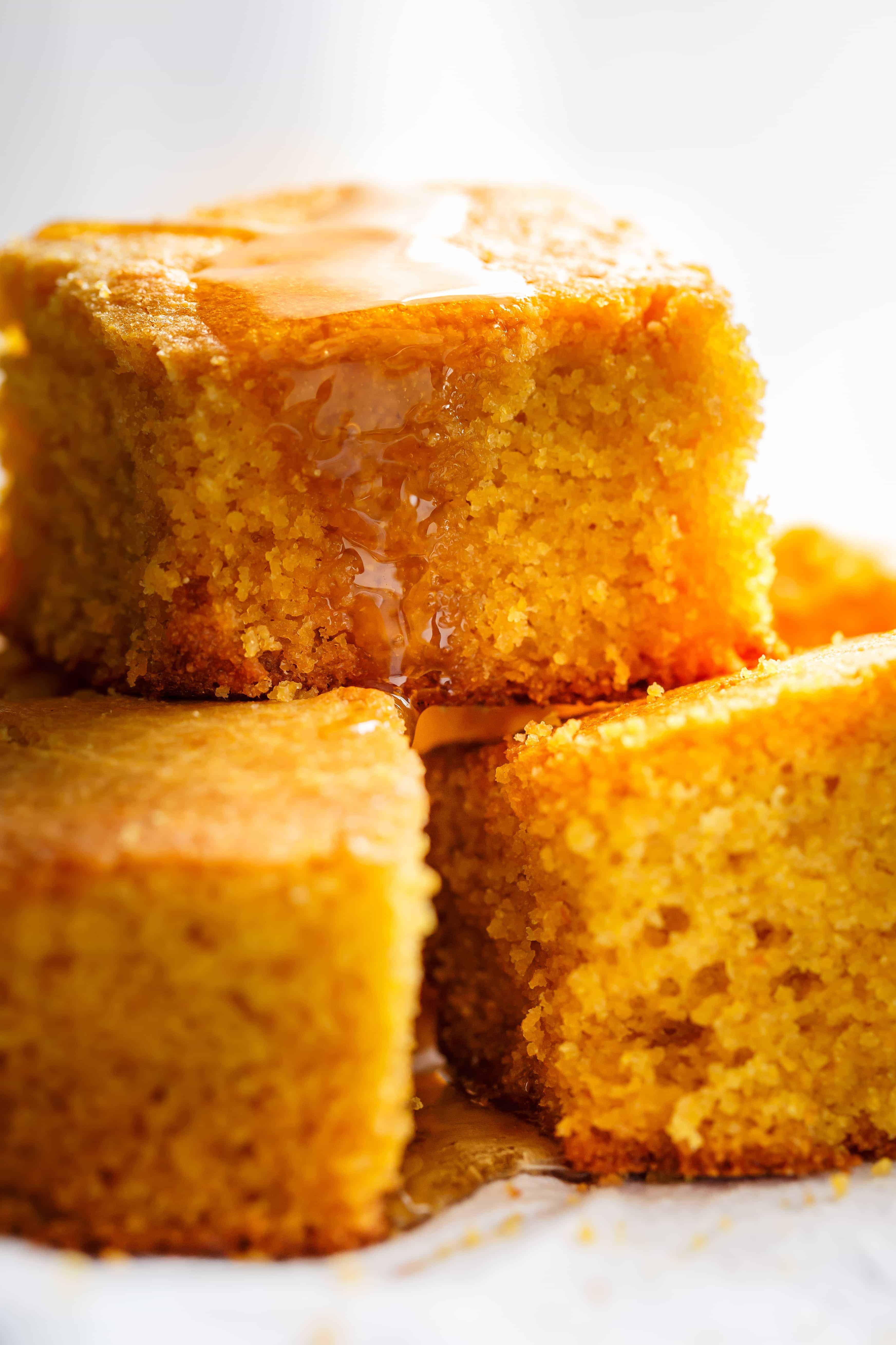 Easy Buttermilk Cornbread with a hint of honey is the perfect side to chili's, soups or stews! Crunchy buttery edges with a soft and fluffy centre!