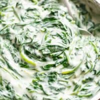 Easy Creamed Spinach does not get easier! This simple homemade side dish is so much better than store bought, and is ready in no time! | Cafe Delites
