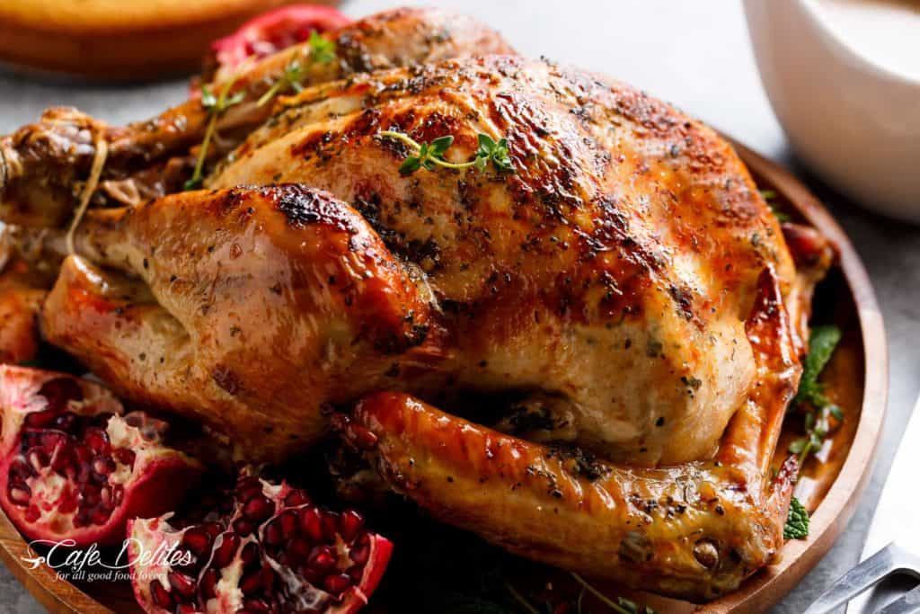 Crispy Skinned Slow Cooker Turkey is THE MOST succulent Turkey, WITHOUT brining OR marinading! This Turkey will have EVERYONE talking! cafedelites