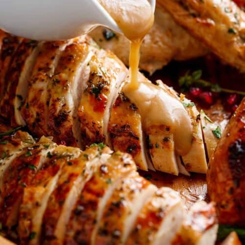 Crispy Skinned Slow Cooker Turkey is THE MOST succulent Turkey, WITHOUT brining OR marinading! This Turkey will have EVERYONE talking! cafedelites