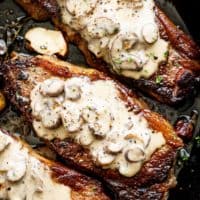 Pan Seared Garlic Butter Steak & Mushroom Cream Sauce is a perfect dinner! A little butter adds something special to your steak in less than 10 minutes! | cafedelites.com