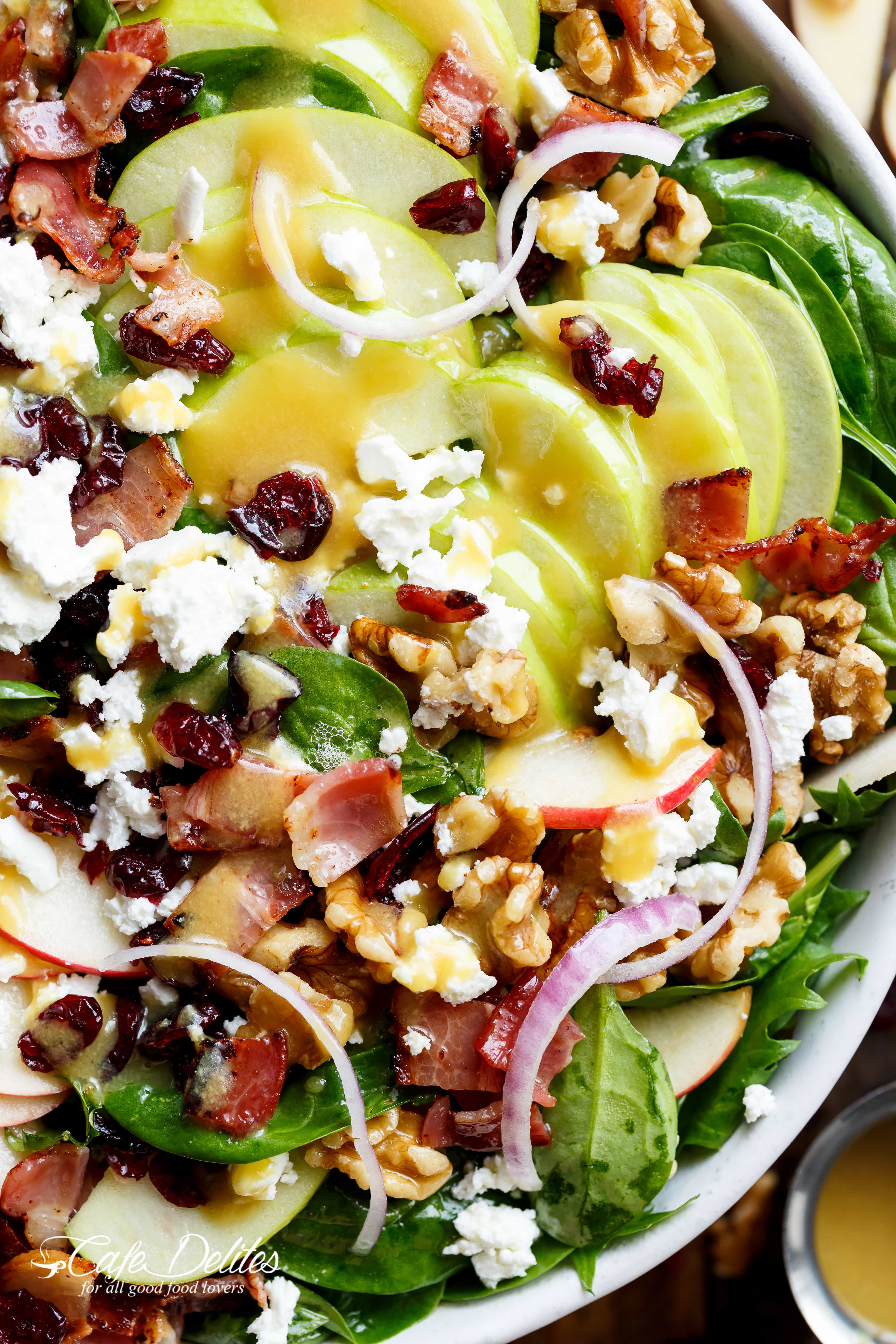 Honey Dijon Apple Bacon Cranberry Salad screams FALL! Cranberries, Spinach, Walnuts And BACON! All drizzled with the most perfect Honey Dijon Dressing! | Cafe Delites