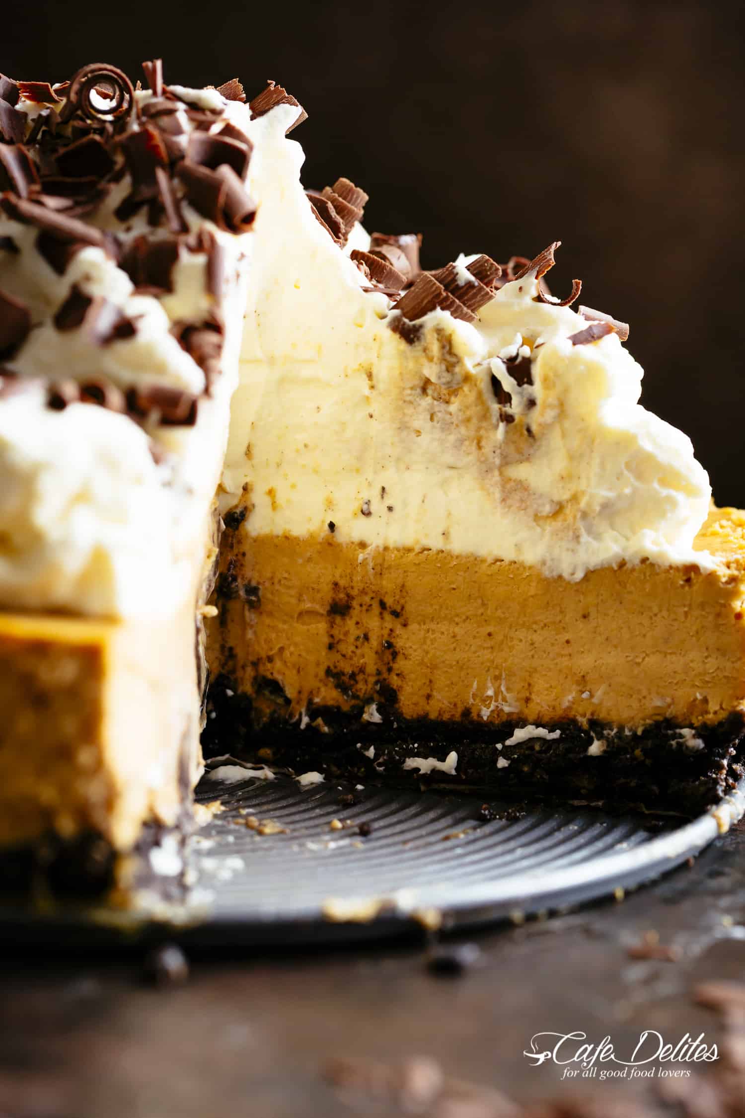 Pumpkin Cheesecake with a chocolate Oreo base and bourbon whipped cream Chocolate Pumpkin Cheesecake