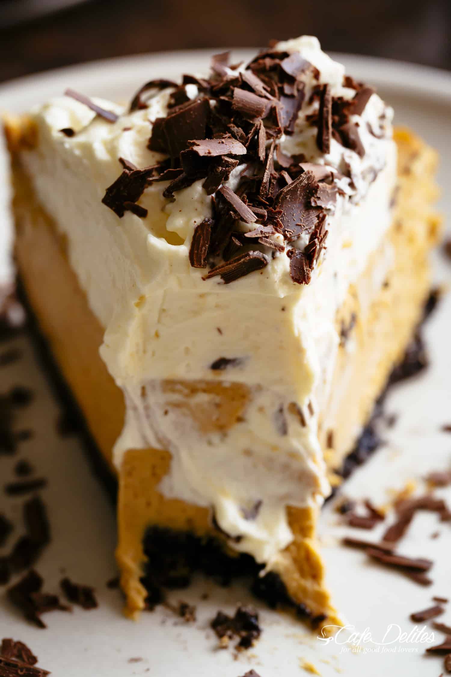 Pumpkin Cheesecake with a chocolate Oreo base and bourbon whipped cream Chocolate Pumpkin Cheesecake