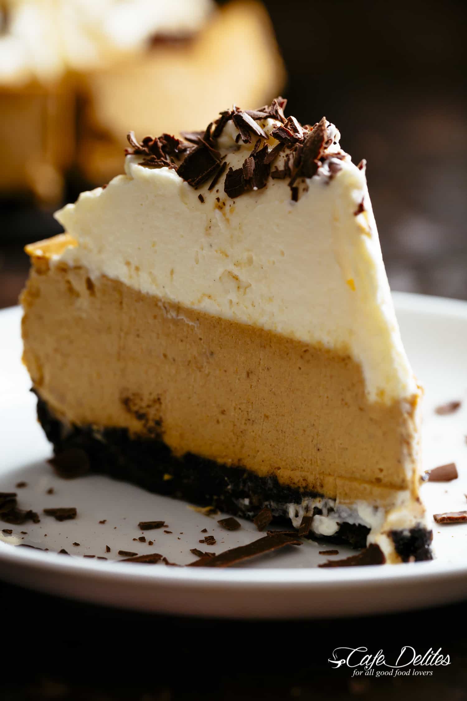 Pumpkin Cheesecake with a chocolate Oreo base and bourbon whipped cream Chocolate Pumpkin Cheesecake