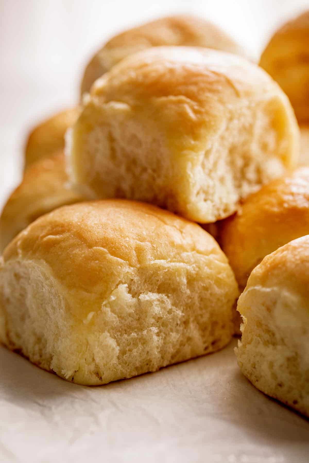 Stack of soft dinner rolls. 