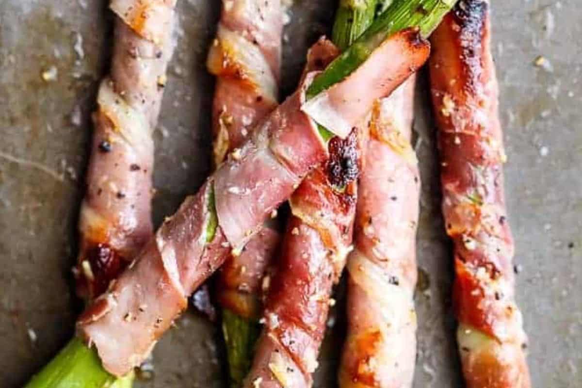 Serve Garlic Butter Prosciutto Asparagus immediately.