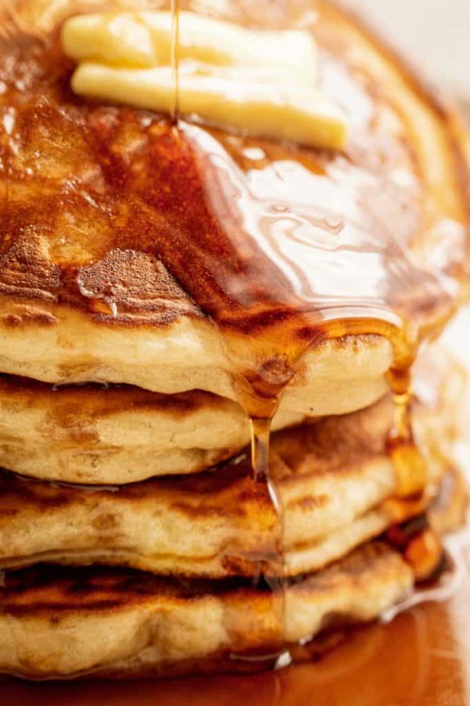 Look no further because a steaming stack of perfectly soft, Best Fluffy Pancakes are right here! Weekends will never be the same again! | https://cafedelites.com