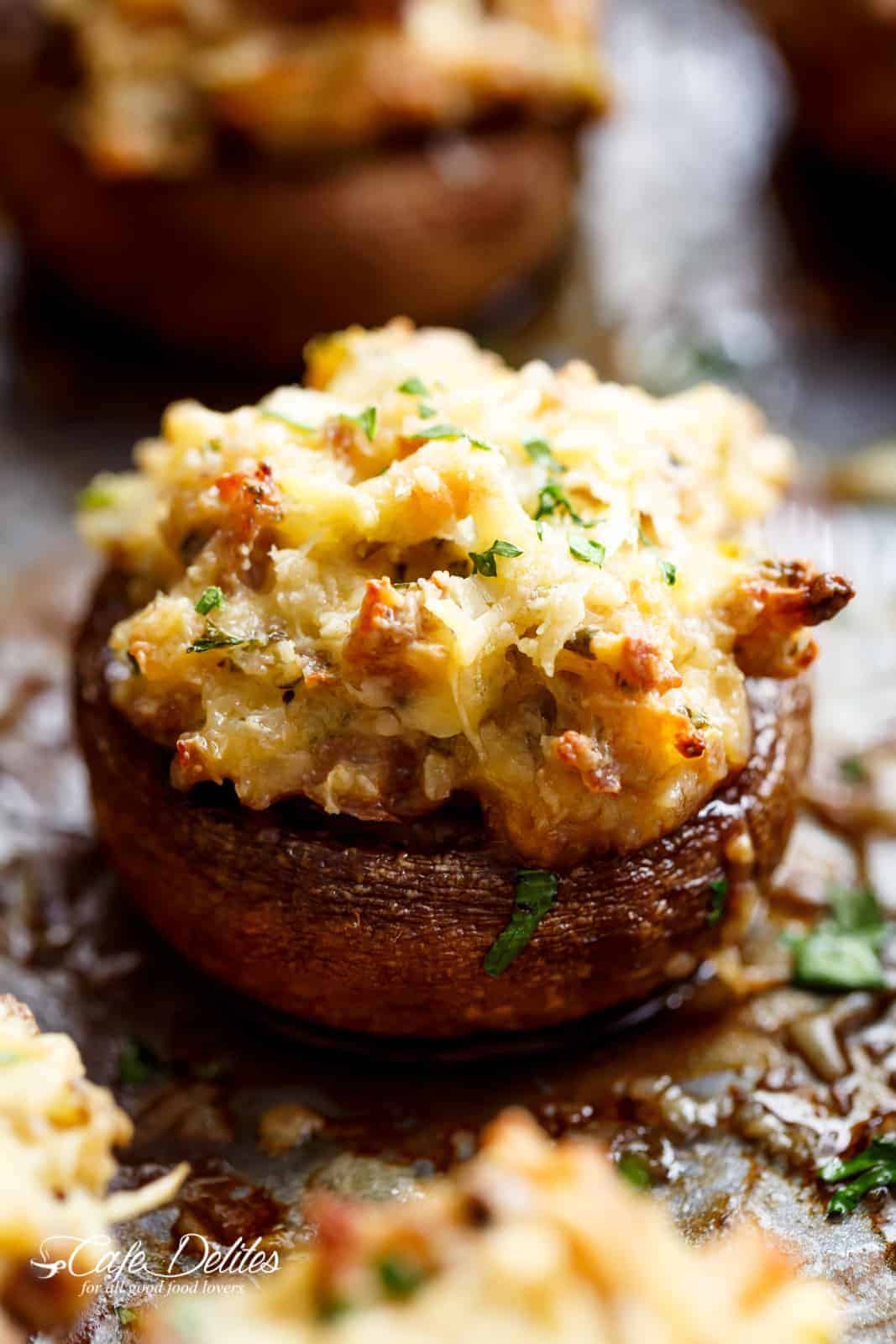Sausage Cream Cheese Dip Stuffed Mushrooms are the ultimate delicious appetiser for any occasion! | cafedelites.com