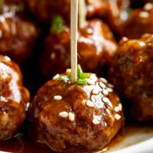 zoom in image of Teriyaki Beef Meatballs picked with toothpick