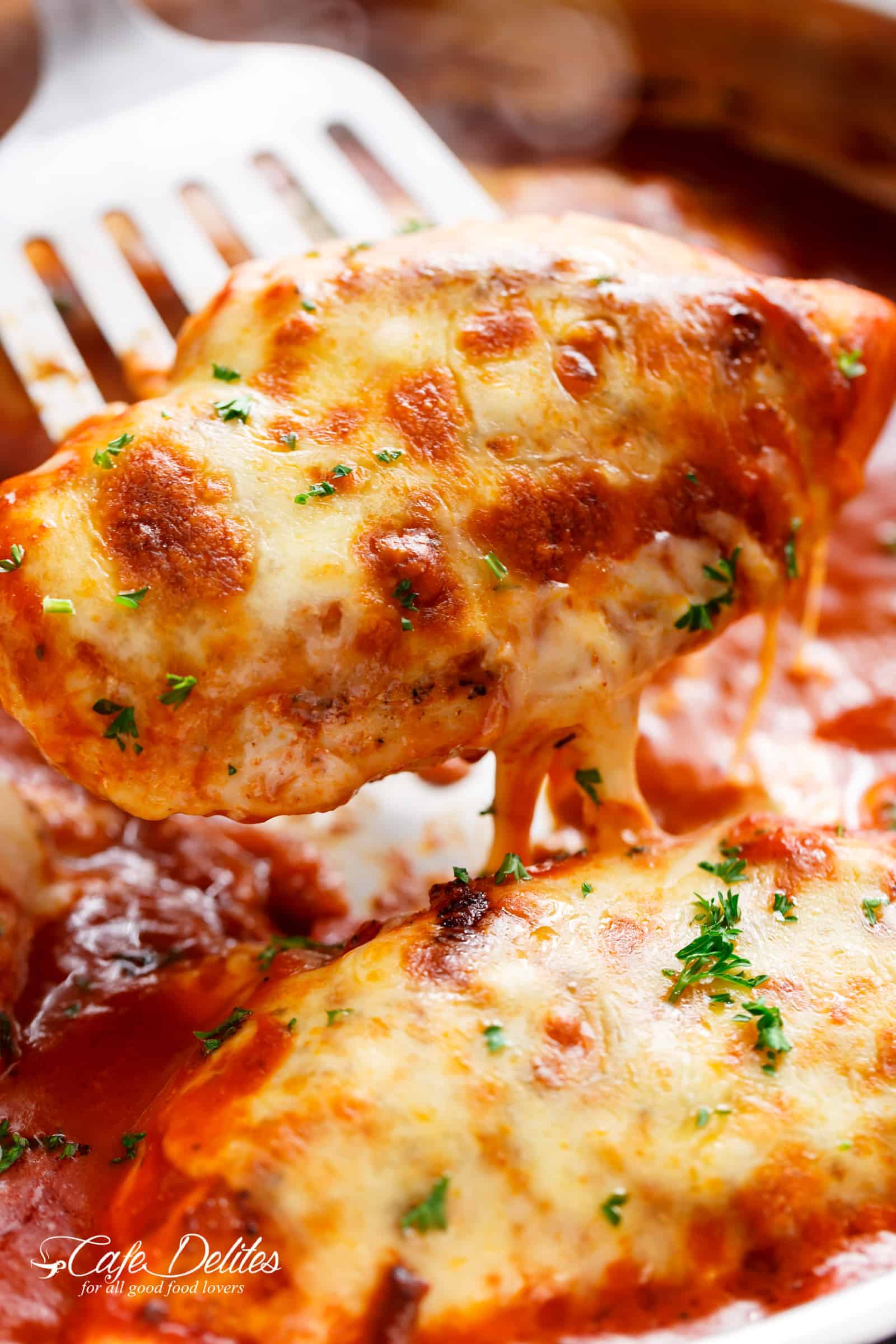 Easy Mozzarella Chicken is a low carb dream! You don't even MISS a crispy crumb on this chicken...it is SO good! | cafedelites.com