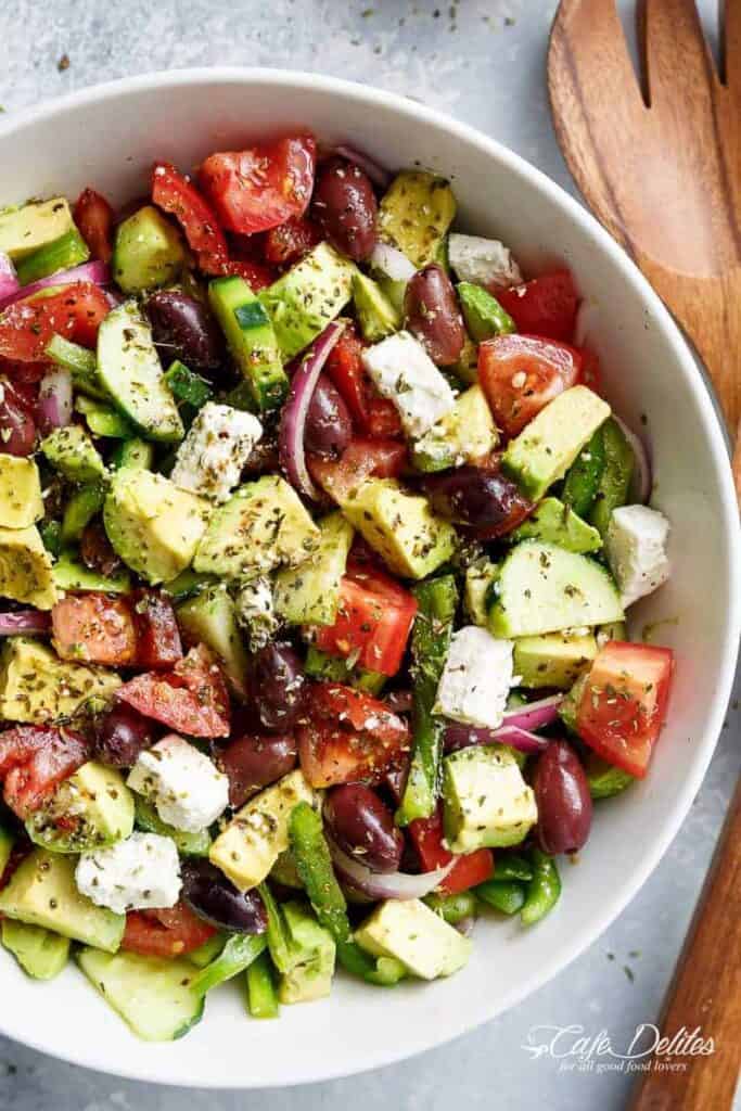 Avocado Greek Salad with a Greek Salad Dressing in a bowl