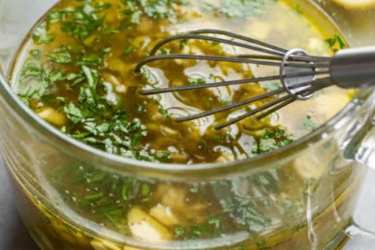 In a small jug or jar, whisk together the olive oil, lemon juice, parsley, garlic, and salt until well combined.