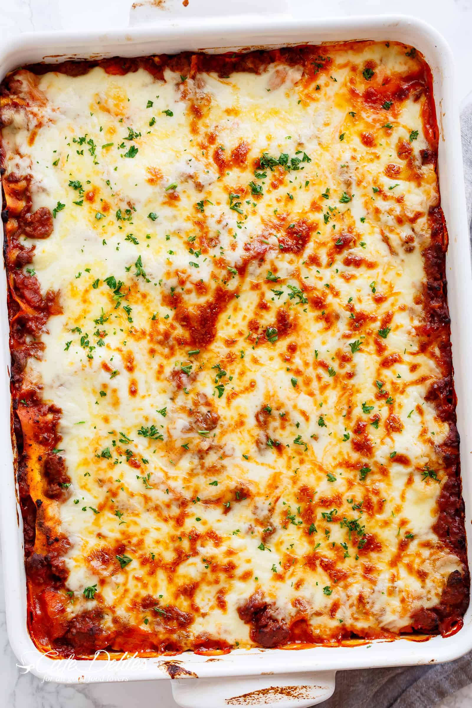  Layered with a rich meat sauce and a creamy parmesan white sauce Best Lasagna