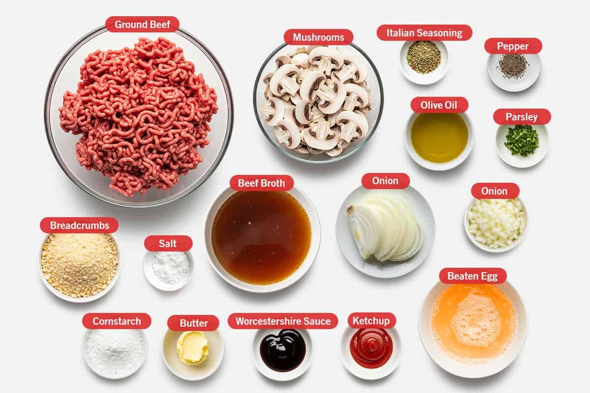 Top shot of ingredients: Ground beef, mushroom, Italian seasoning, pepper, olive oil, parsley, onion, beef broth, salt, breadcrumbs, cornstarch, butter, Worcestershire sauce, ketchup, beaten egg.