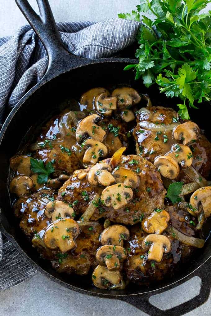 This classic Salisbury Steak is smothered in a mushroom and onion gravy and is ready in ju Salisbury Steak with Mushroom Gravy