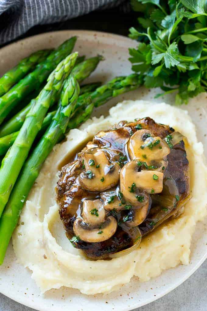 Salisbury steak is perfect served over mashed potatoes with a green vegetable.