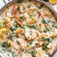 Creamy Garlic Butter Shrimp Piccata is the recipe of your dreams! Garlic butter shrimp coated in a rustic creamy garlic parmesan sauce with a hint of lemon, capers and spinach! | cafedelites.com