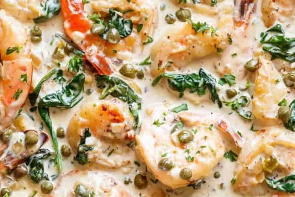 Return shrimp to skillet, stir in lemon juice, capers, and parsley, then serve with lemon slices.