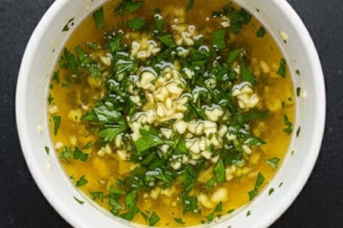 Combine melted butter, garlic and parsley in a small bowl then pour over the potatoes.