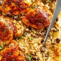 Easy Oven Baked Chicken And Rice With Garlic Butter Mushrooms mixed through is winner of a chicken dinner! | cafedelites.com