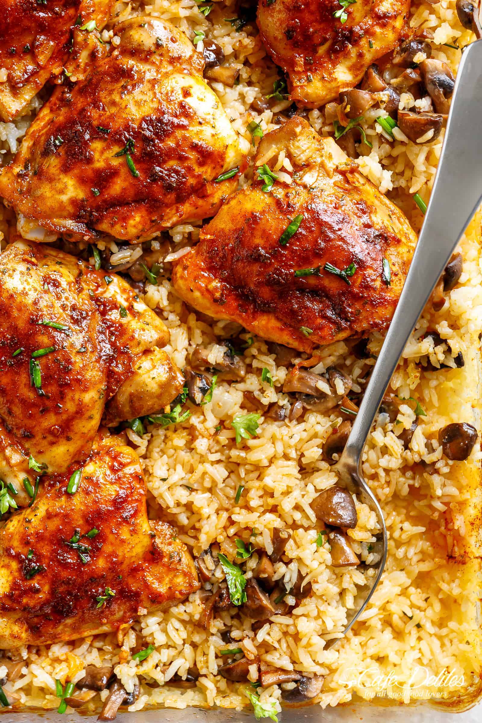 Easy Oven Baked Chicken And Rice With Garlic Butter Mushrooms mixed through is winner of a chicken dinner! | cafedelites.com