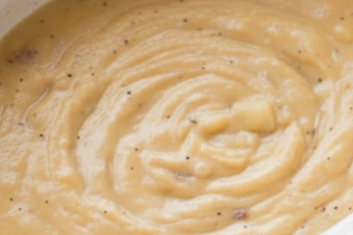 Mash about half of the potatoes directly in the slow cooker to naturally thicken the soup while keeping some chunks.