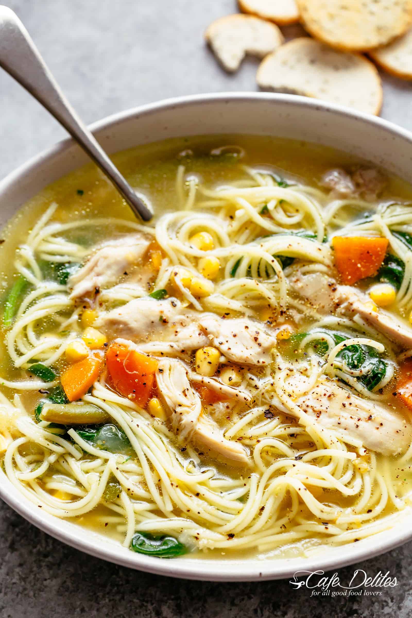 Big bowl of chicken noodle soup broth | cafedelites.com
