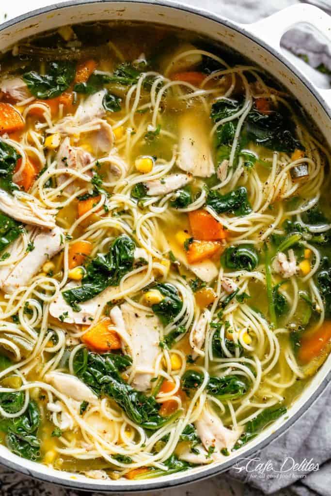 Homemade Chicken Noodle Soup loaded with vegetables with a delicious broth made from scratch! One pot...one soup! Perfect for any day of the week with the broth AND the soup made from scratch in under 45 minutes. You will love this! | cafedelites.com