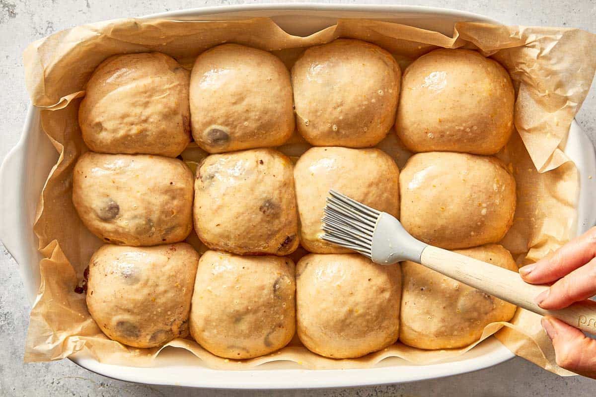 baked chocolate hot cross buns with chocolate crosses and glaze