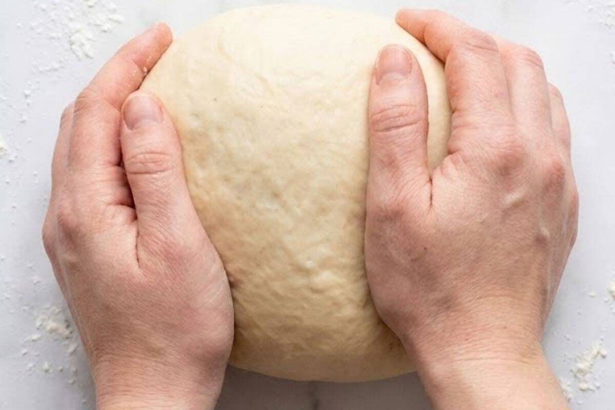 Transfer the dough to a lightly floured surface and knead for 5 to 10 minutes