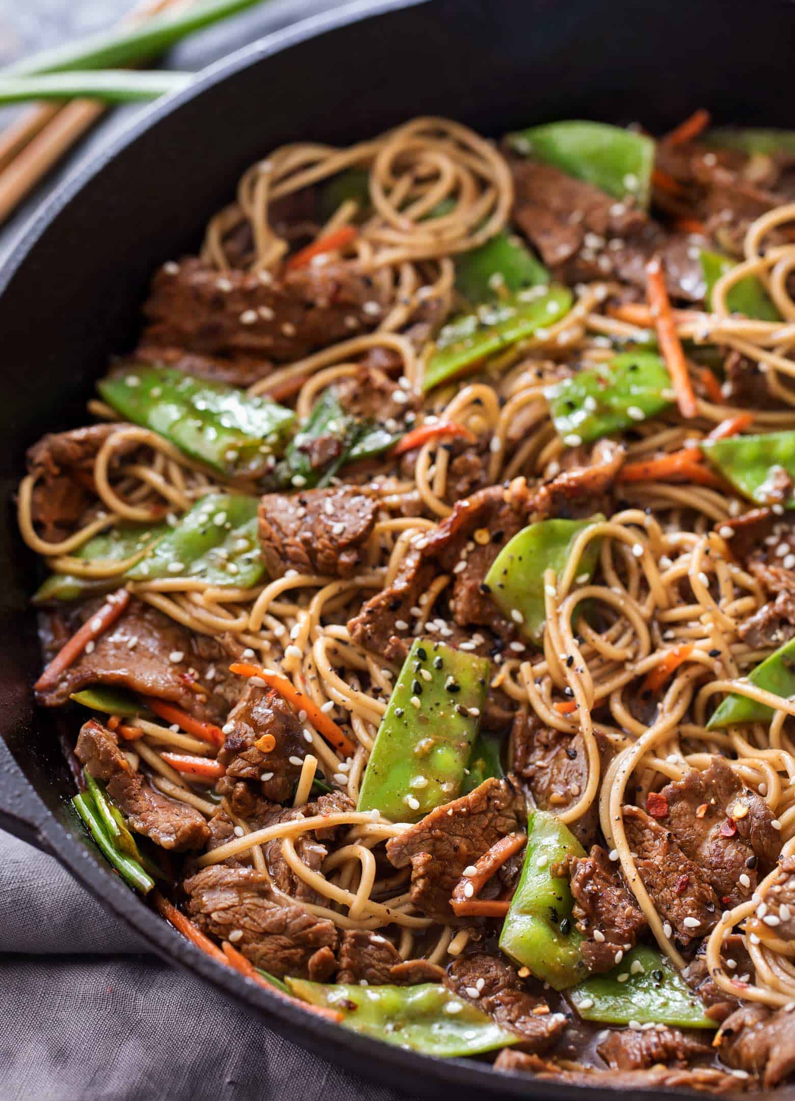 Skillet full of stir fry and ramen noodles