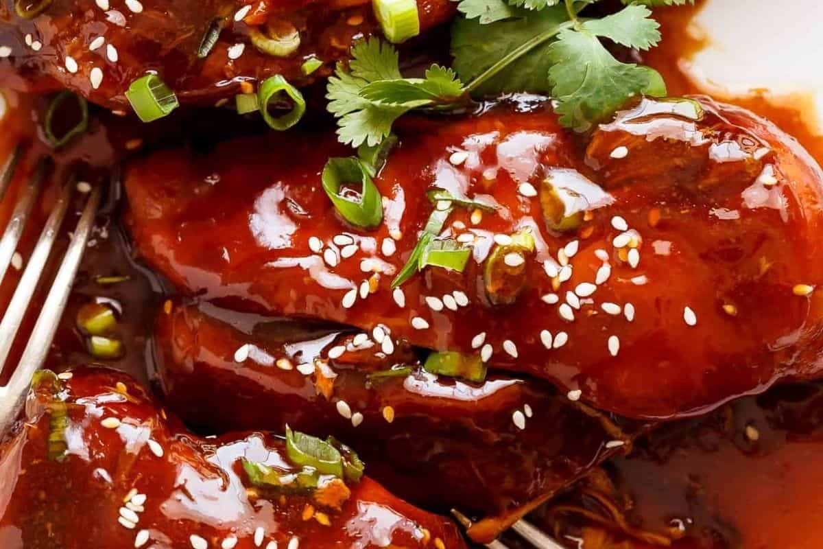 Finish with the remaining sliced scallions and a sprinkle of sesame seeds.