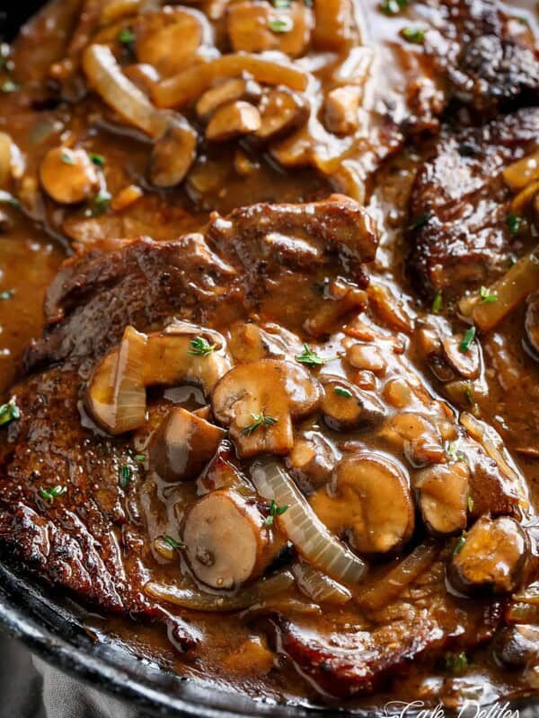 Ribeye Steaks With Mushroom Gravy in a pan