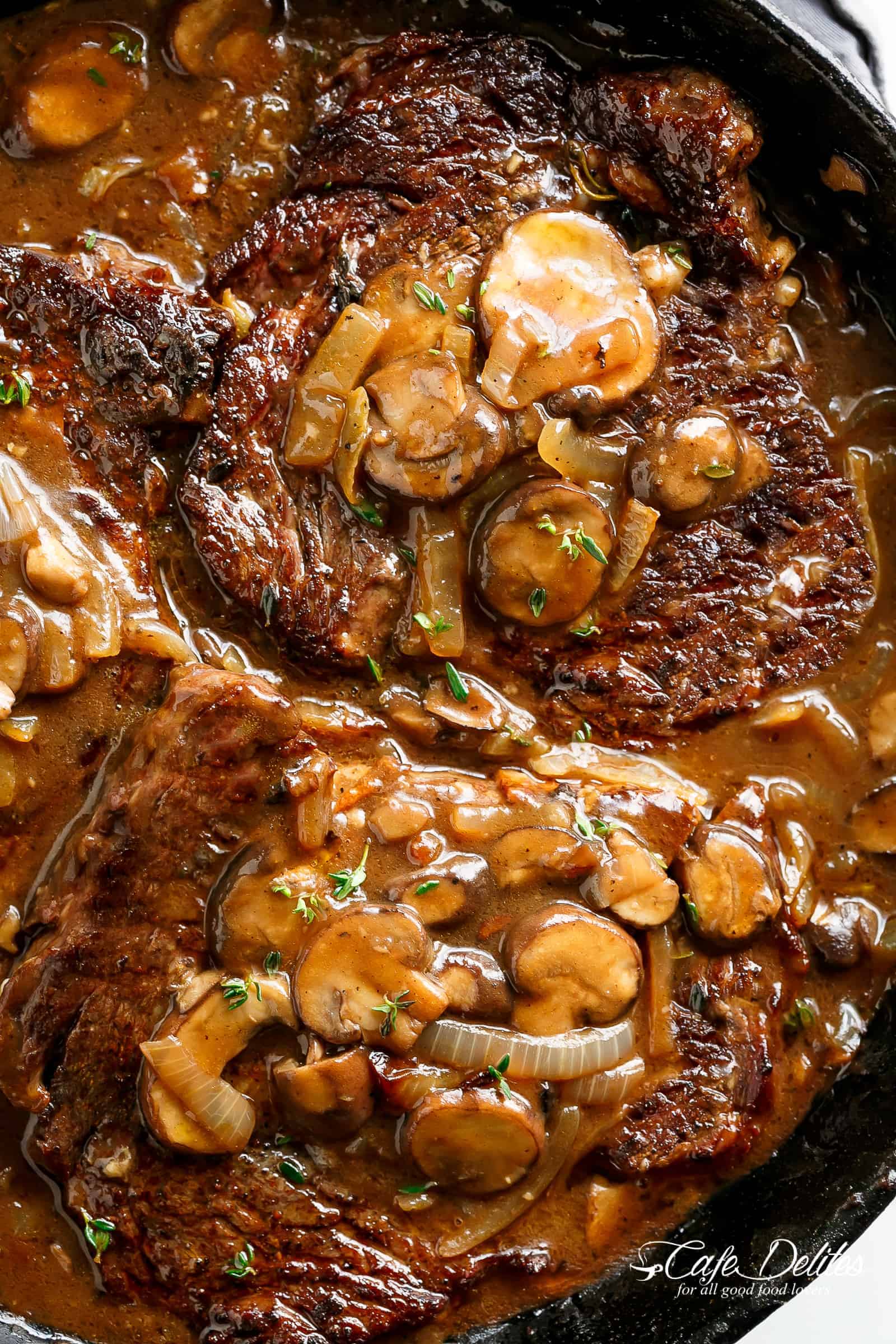 Ribeye Steaks With Mushroom Gravy is simple and delicious! Have dinner served on the table in 15 minutes! | cafedelites.com