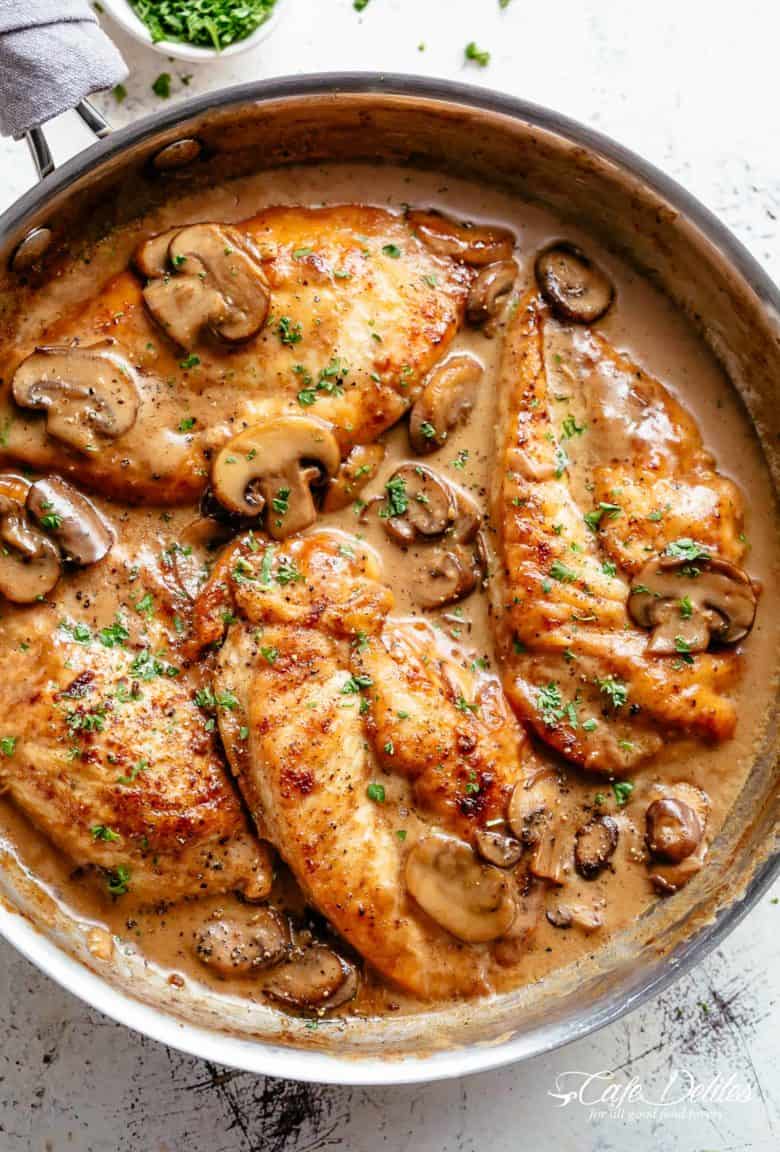 Chicken Marsala in a thick and creamy mushroom sauce rivals any restaurant! One of the most sought after dishes served in restaurants is super fast and easy to make in your very own kitchen! A flavourful chicken dinner with plenty of sauce to serve over your sides and an authentic Italian taste! | cafedelites.com