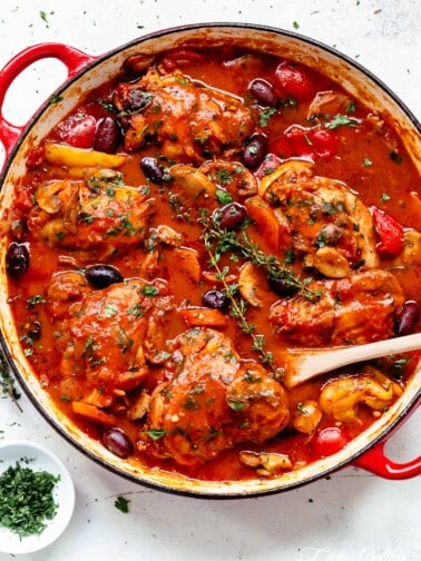 The BEST Chicken Cacciatore in a rich and rustic sauce with chicken falling off the bone is simple Italian comfort food at its best! Authentic Chicken Cacciatore is an Italian classic, and you'll never get a more succulent home cooked meal than this recipe! Easy to make and loved by the entire family! | cafedelites.com