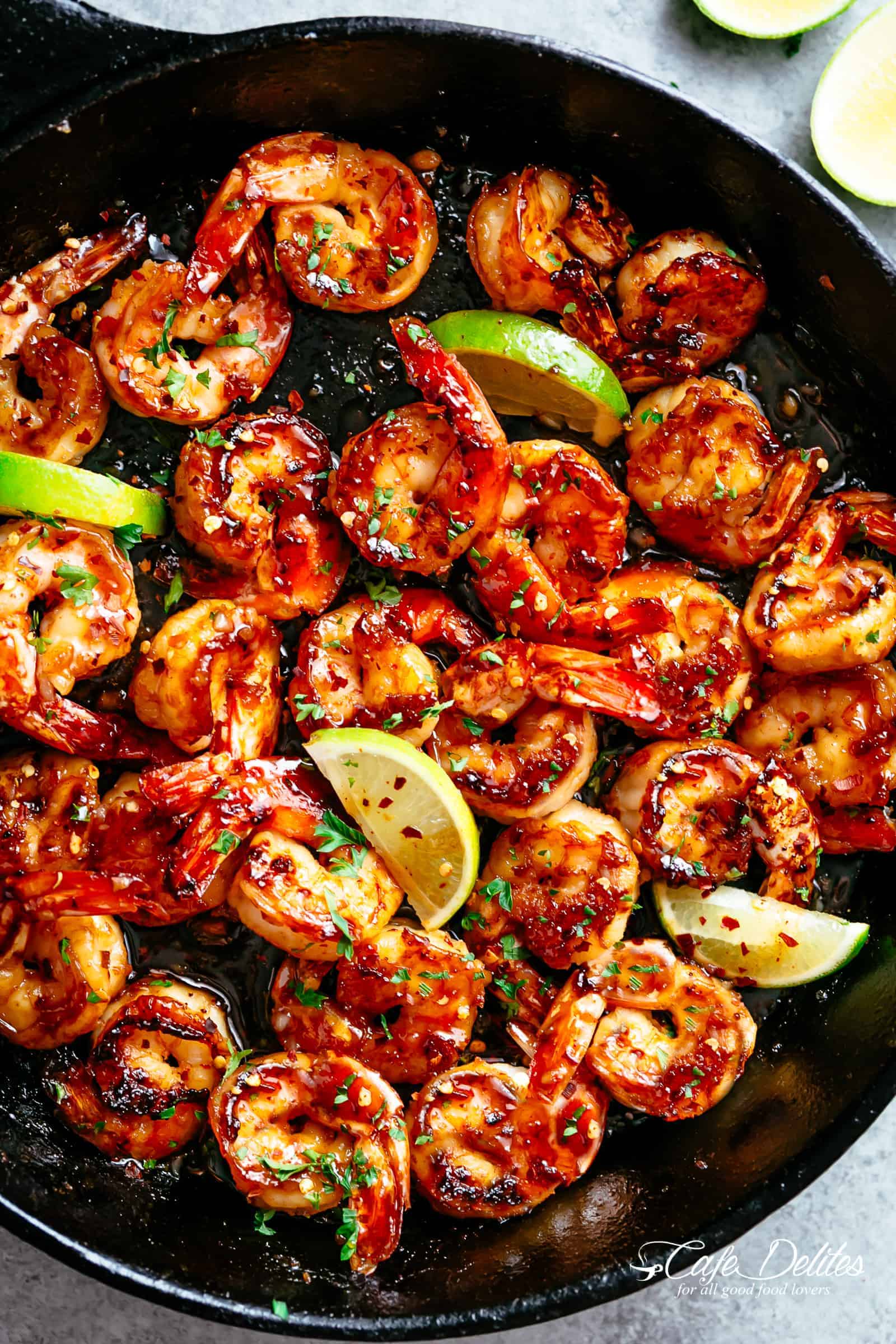 Browned Butter Honey Lime Shrimp with a subtle hint of chili will become your new favourite shrimp recipe! Shrimp that tastes like something straight out of a restaurant and feels gourmet with half of the effort and maximum taste! On your table in less than 15 minutes with no marinating! | cafedelites.com