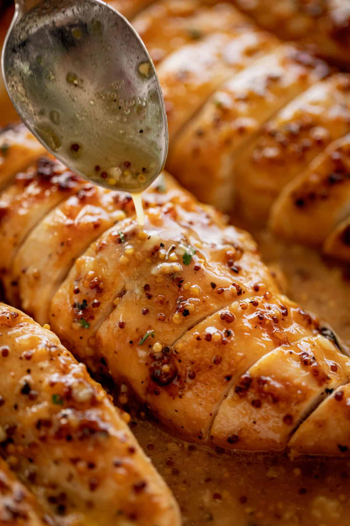 Juicy Honey Mustard Baked Chicken Breasts will become your new favourite chicken breast recipe. | cafedelites.com