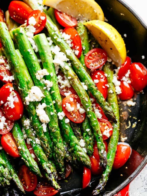 Lemon Garlic Asparagus topped feta cheese, tomatoes and drizzled with Mediterranean flavours