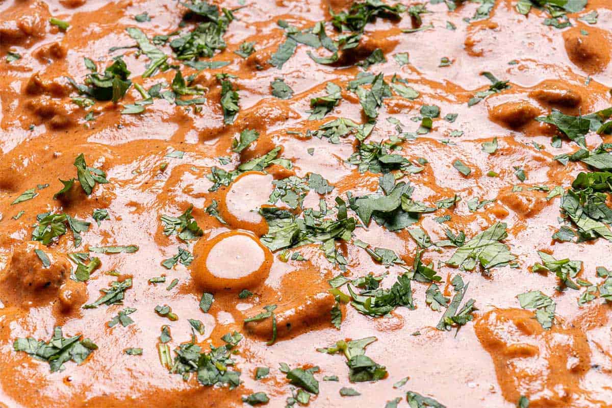 finished tikka masala garnished with fresh parsley